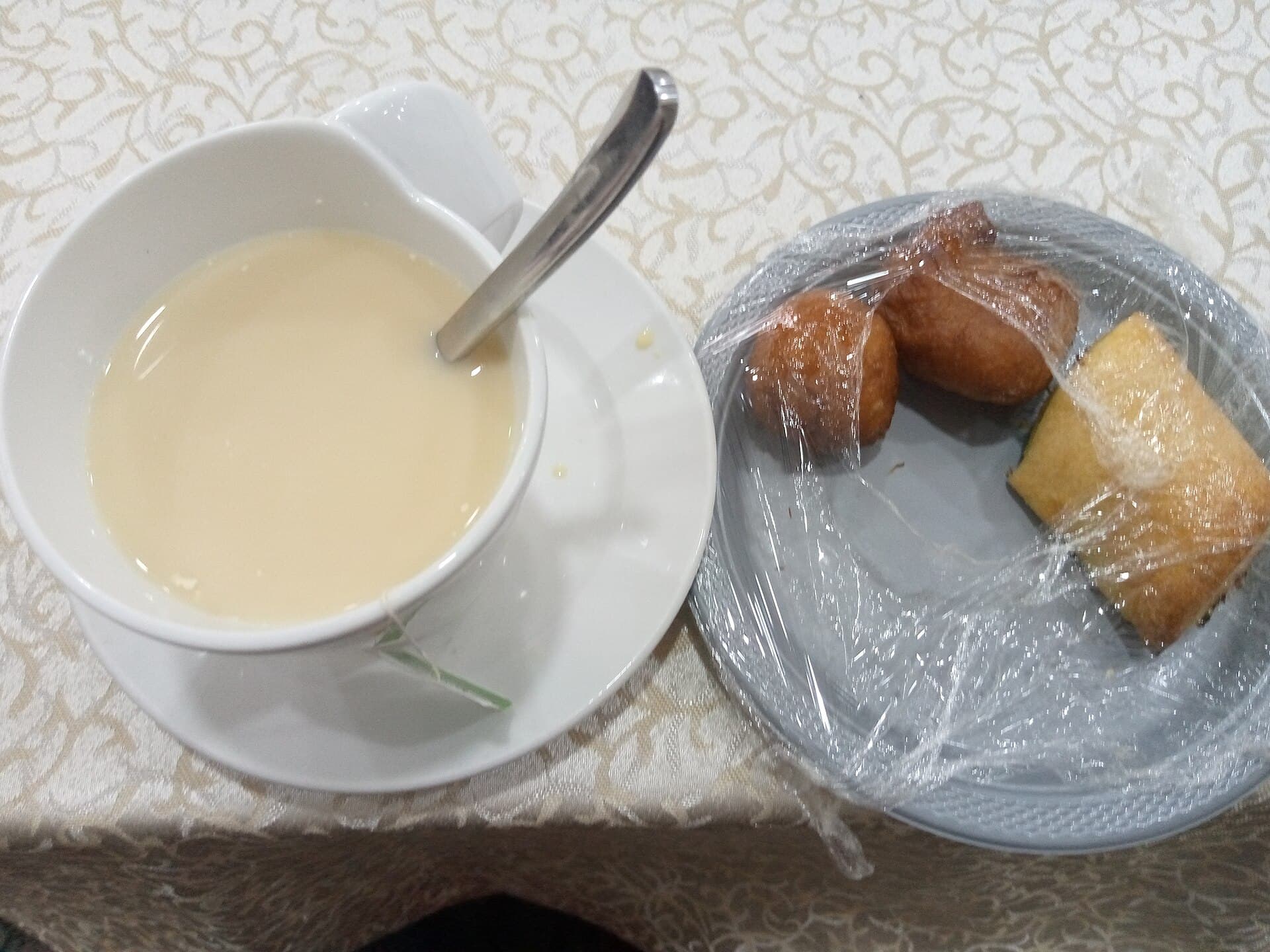 Photo of a green tea cup and snacks used for the Agree Superfoods tea comparison article