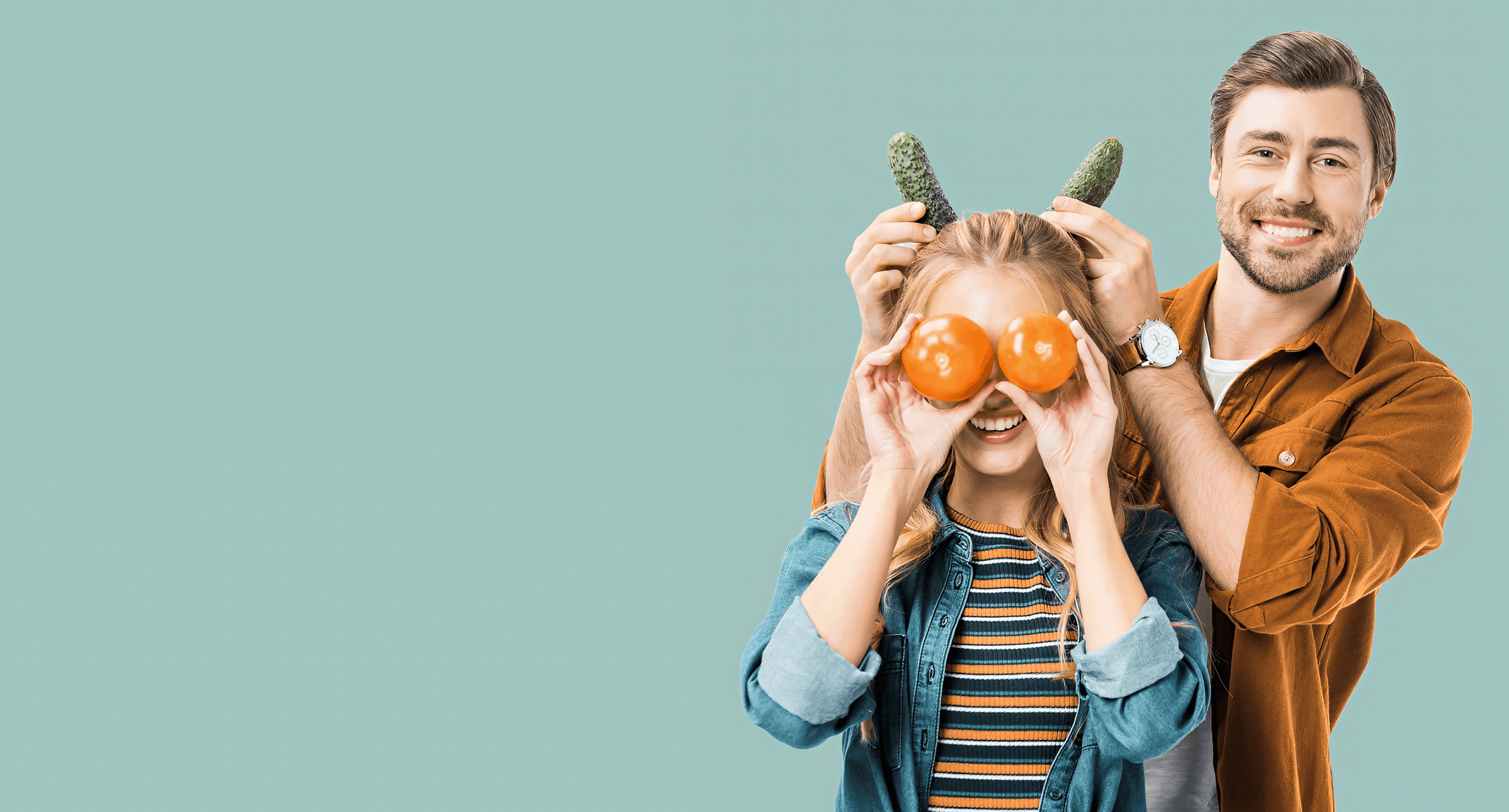 Wide healthy lifestyle image with smiling people holding fresh produce for the Agree Superfoods article on healthy snack brands in India